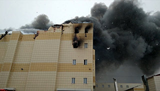 Спасатели увеличивают силы на пожаре в Кемерово, одном из крупнейших за 100 лет
