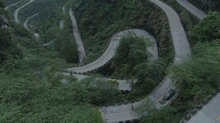 Zipping down in windy roads in China's extreme sport challenge