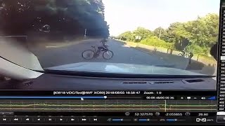 Close call after driver narrowly misses hitting a child cyclist in England